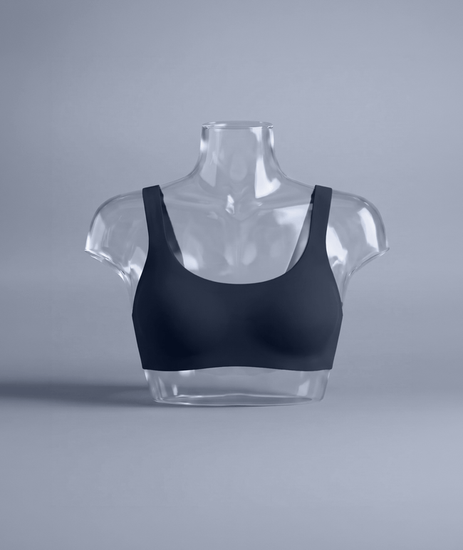 Daily Embrace in Navy, bust close-up on a clear display form showing the smooth seam-free cups and wide straps